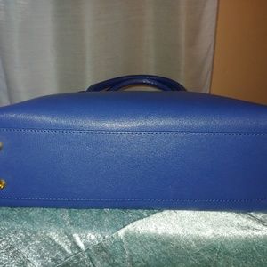 Massimo Castelli purse